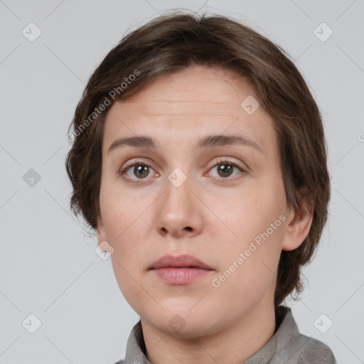 Neutral white young-adult female with medium  brown hair and brown eyes