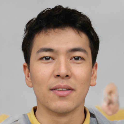 Neutral asian young-adult male with short  brown hair and brown eyes
