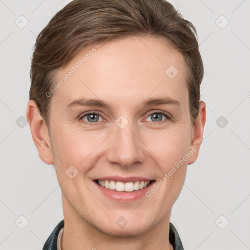 Joyful white young-adult female with short  brown hair and grey eyes