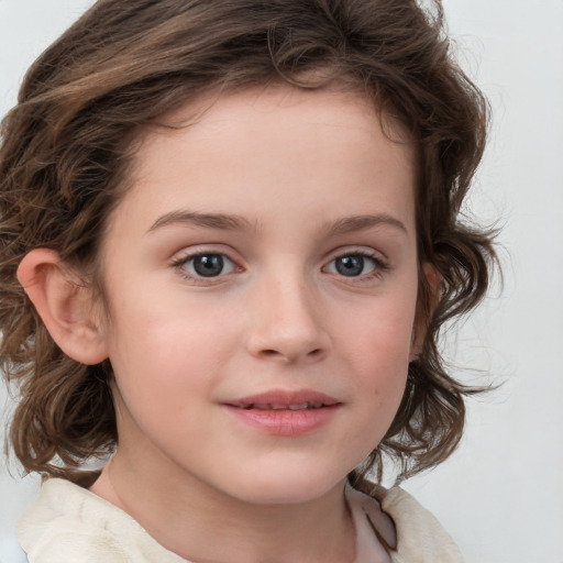 Joyful white child female with medium  brown hair and brown eyes