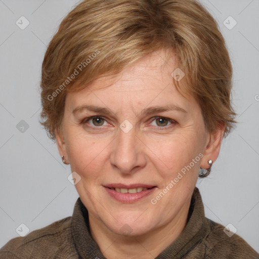 Joyful white adult female with medium  brown hair and grey eyes