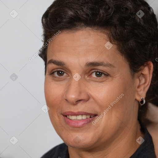 Joyful white adult female with short  brown hair and brown eyes