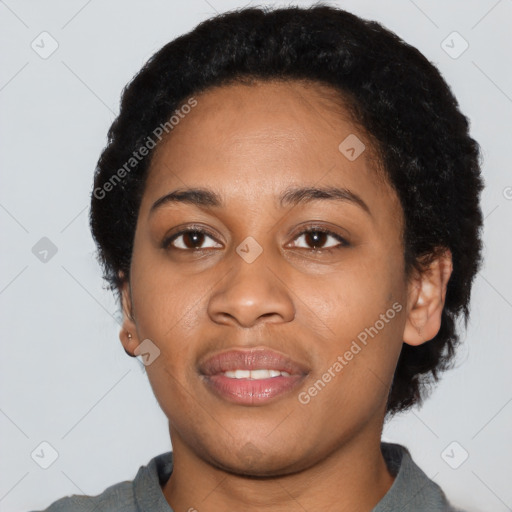 Joyful latino young-adult female with short  black hair and brown eyes