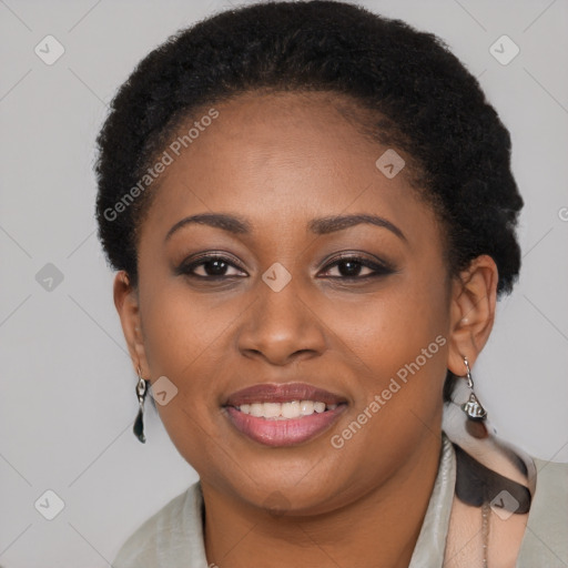 Joyful black young-adult female with short  brown hair and brown eyes