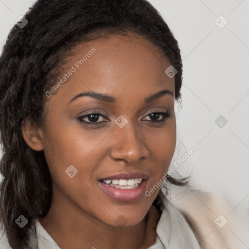 Joyful black young-adult female with long  brown hair and brown eyes