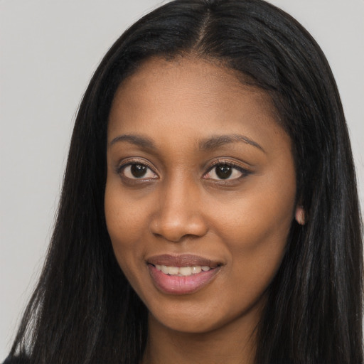 Joyful asian young-adult female with long  black hair and brown eyes