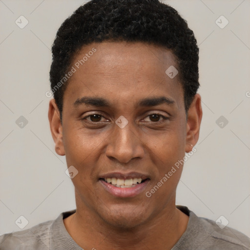 Joyful black young-adult male with short  black hair and brown eyes