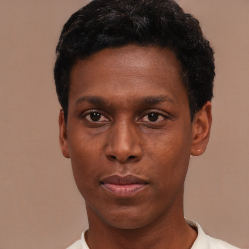 Neutral black young-adult male with short  black hair and brown eyes