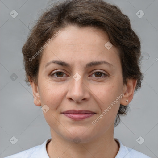 Joyful white adult female with short  brown hair and brown eyes