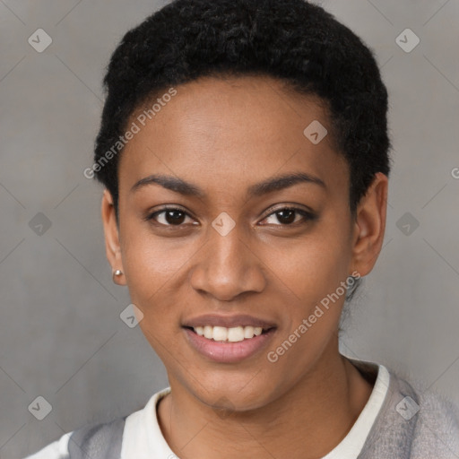 Joyful black young-adult female with short  black hair and brown eyes