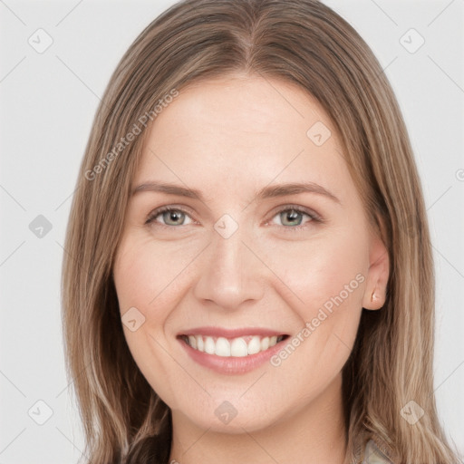 Joyful white young-adult female with long  brown hair and grey eyes