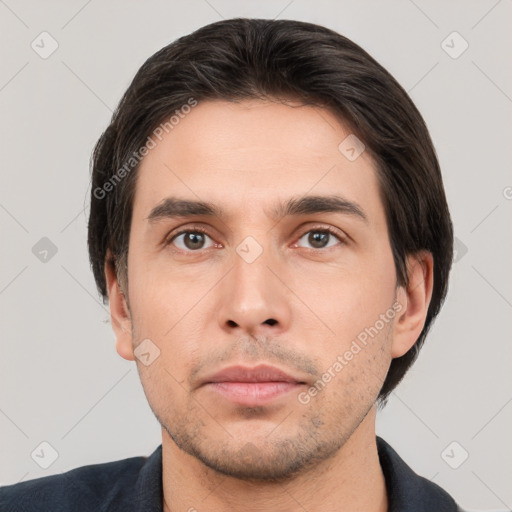 Neutral white young-adult male with short  brown hair and brown eyes