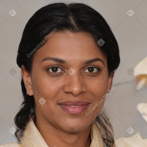 Joyful asian adult female with medium  brown hair and brown eyes