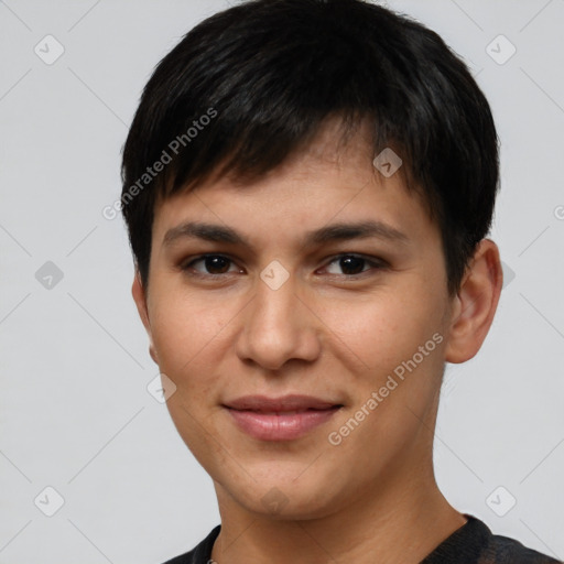 Joyful latino young-adult female with short  brown hair and brown eyes