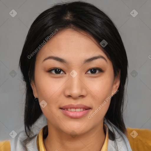 Joyful asian young-adult female with medium  black hair and brown eyes