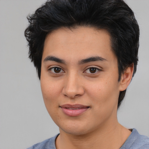 Joyful asian young-adult female with short  black hair and brown eyes