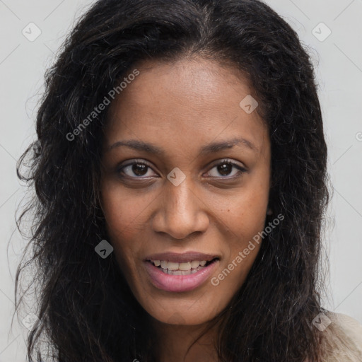 Joyful black young-adult female with long  brown hair and brown eyes