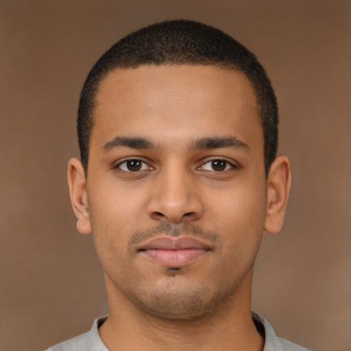 Neutral latino young-adult male with short  brown hair and brown eyes