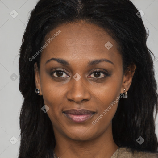 Joyful black young-adult female with long  brown hair and brown eyes