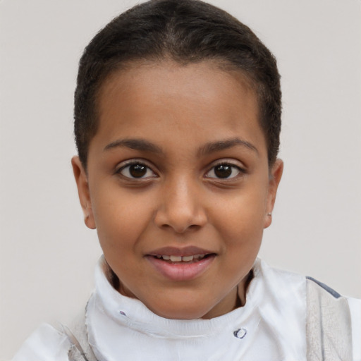 Joyful latino child female with short  brown hair and brown eyes