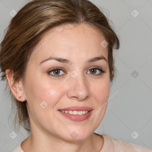 Joyful white young-adult female with medium  brown hair and blue eyes