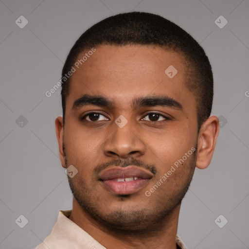 Joyful latino young-adult male with short  brown hair and brown eyes