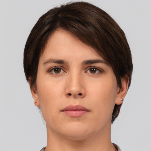 Neutral white young-adult female with short  brown hair and brown eyes