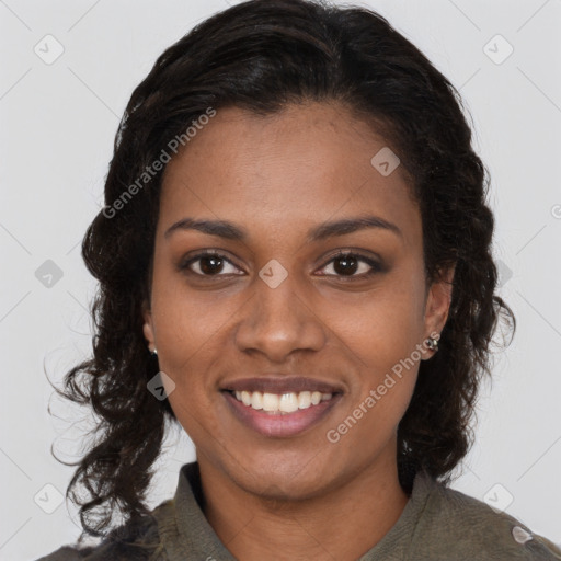 Joyful black young-adult female with medium  brown hair and brown eyes