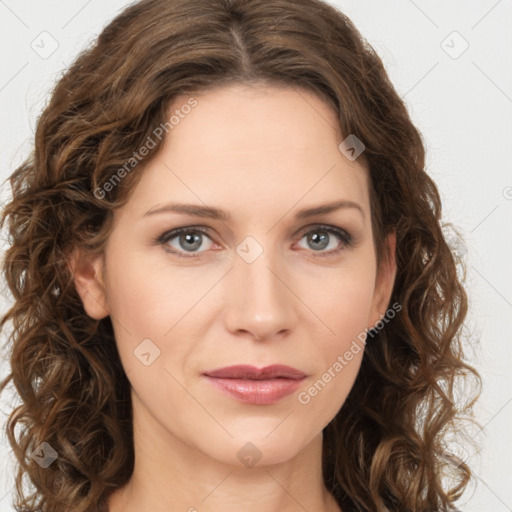 Joyful white young-adult female with long  brown hair and green eyes