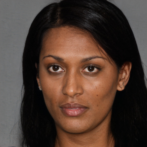 Neutral black young-adult female with long  black hair and brown eyes