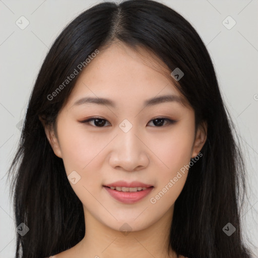 Joyful asian young-adult female with long  brown hair and brown eyes