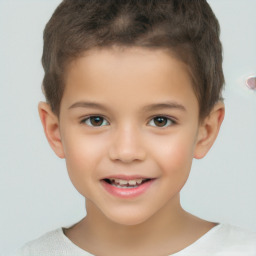 Joyful white child male with short  brown hair and brown eyes