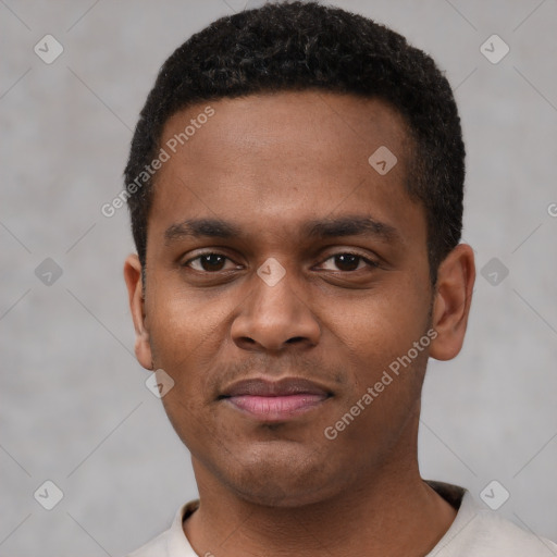 Joyful latino young-adult male with short  brown hair and brown eyes