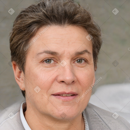 Joyful white adult female with short  brown hair and brown eyes