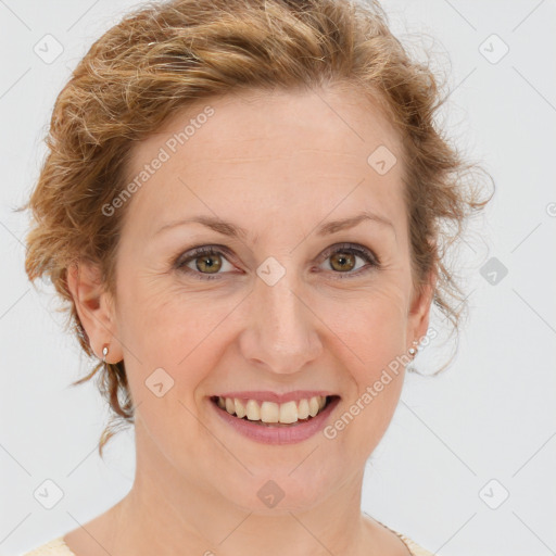 Joyful white young-adult female with medium  brown hair and green eyes