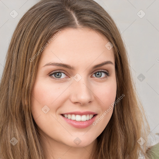 Joyful white young-adult female with long  brown hair and green eyes