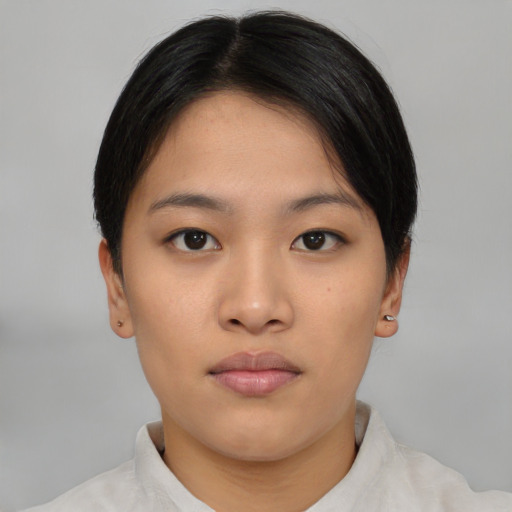 Neutral asian young-adult female with short  black hair and brown eyes