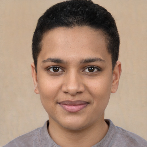 Joyful latino young-adult female with short  black hair and brown eyes
