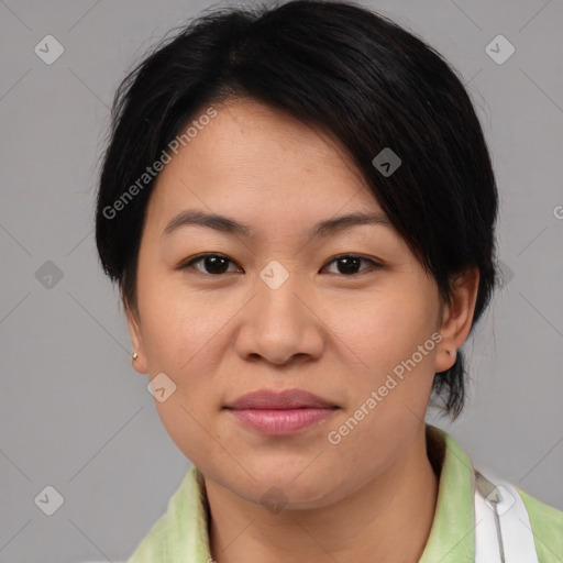 Joyful asian young-adult female with medium  brown hair and brown eyes