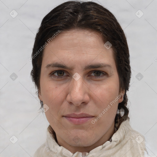 Joyful white adult female with medium  brown hair and brown eyes