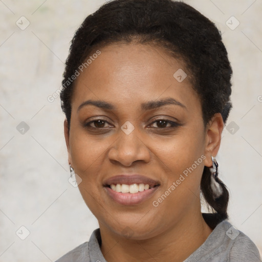 Joyful latino young-adult female with short  brown hair and brown eyes