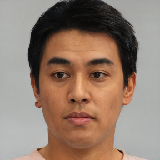 Neutral asian young-adult male with short  black hair and brown eyes