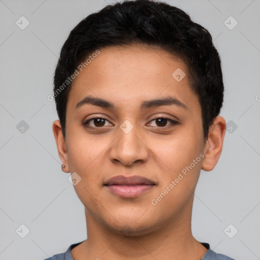 Joyful latino young-adult female with short  black hair and brown eyes