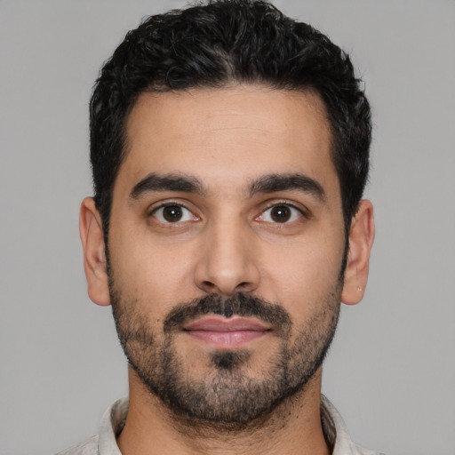 Neutral latino young-adult male with short  black hair and brown eyes