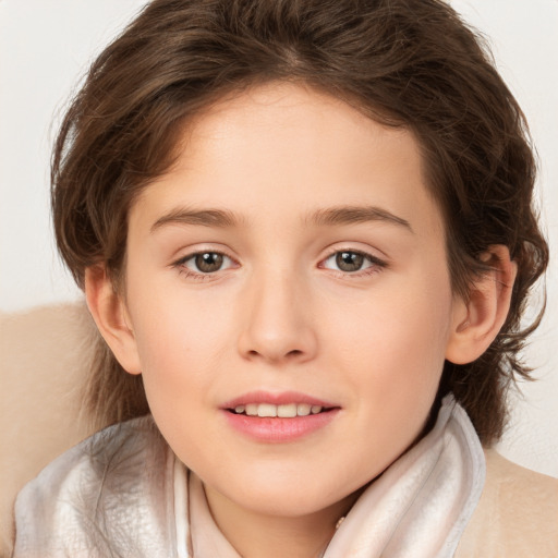 Joyful white child female with long  brown hair and brown eyes