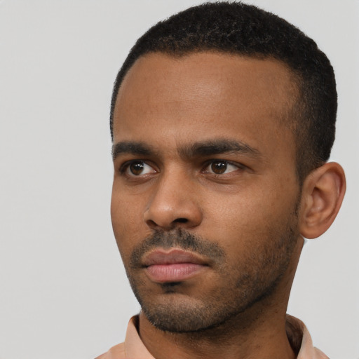 Neutral black young-adult male with short  black hair and brown eyes