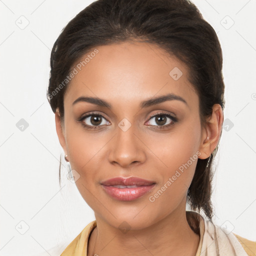 Joyful latino young-adult female with long  brown hair and brown eyes