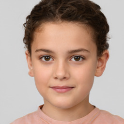 Joyful white child female with short  brown hair and brown eyes