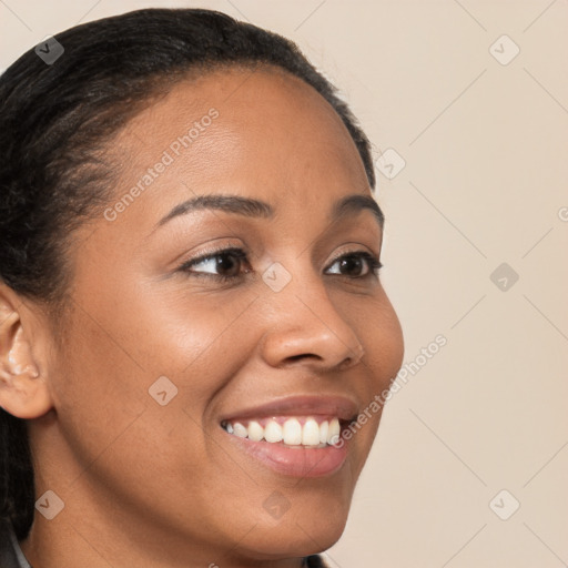 Joyful latino young-adult female with long  brown hair and brown eyes