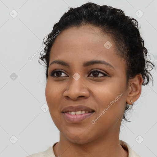 Joyful latino young-adult female with short  black hair and brown eyes